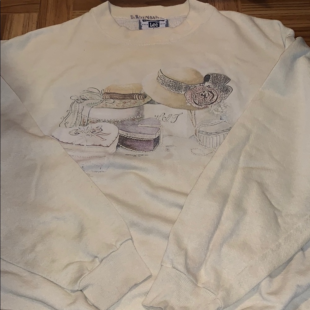 Vintage lee sweater with hats and boxes on it